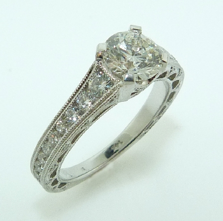 14K white gold engagement ring; - Set with an ideal round brilliant cut diamond by Hearts On Fire; - -Center: 1.01ct G SI1 (HOF85331) - -Accented with round brilliant cut diamonds; 0.77 carat total weight; G/H VS-SI - - - - -