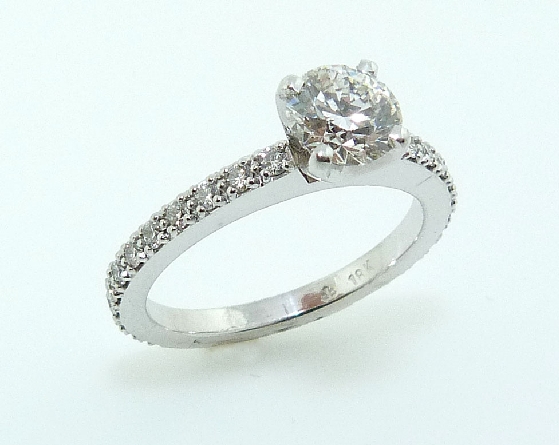 18K white gold engagement ring; set with an ideal round brilliant cut diamond by Hearts On Fire
-centre: 0.722ct F; SI1 (HOF95536)
-accented with ideal round brilliant cut diamonds by Hearts On Fire; 0.33 carat total weight; VS-SI; G/H