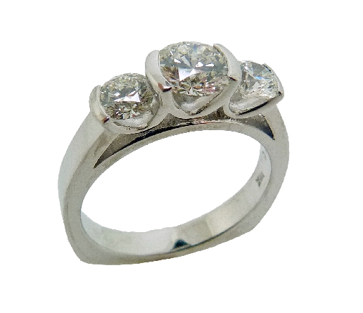 18K white gold three stone engagement ring; set with an ideal round brilliant cut diamond by Hearts On Fire; - -centre: 0.646ct I; SI1 (HOF118547) - -accented with ideal round brilliant cut diamonds by Hearts On Fire; 0.281ct I; SI1 (HOF119020) & 0.28