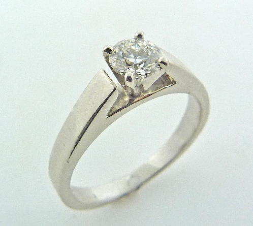 14K white gold solitaire engagement ring - -set with an ideal round brilliant cut diamond by Hearts On Fire; - 0.438ct SI1; G (HOF91137)