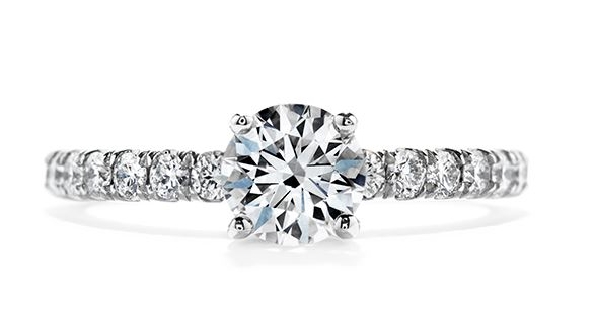 18K white gold enagement ring; known as Enrichment Sensational Series by Hearts On Fire; set with an ideal round brilliant cut diamond by Hearts On Fire
-centre: 1.031ct I VS1
-accented with ideal round brilliant cut diamonds by Hearts On Fire; 0