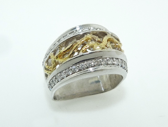 18K white and yellow gold ladies dinner ring set with:
- 38 ideal round brilliant cut diamonds by Hearts On Fire; 0.506 carat total weight VS1-VS2; F/G