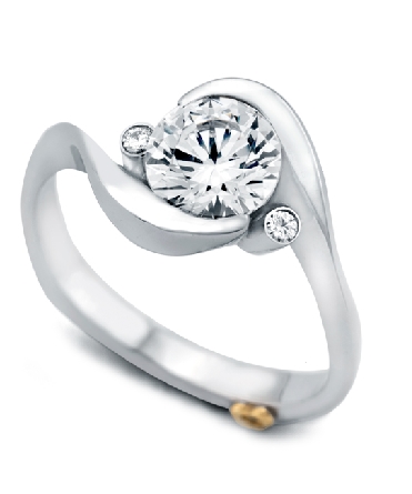 14K white gold engagement ring; known as Spark by Mark Schneider. Accented with two round brilliant cut diamnds; totaling 0.035 carats. Center stone is 1.0 carat CZ