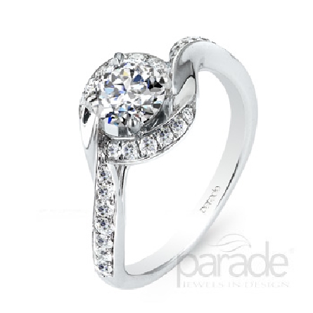 18 karat white gold engagement ring; part of the Hemera Bridal Collection by Parade Designs.
Set with CZ Center.
Accented with 26 very good cut diamonds; 0.27 carat total weigh; SI; G/H.