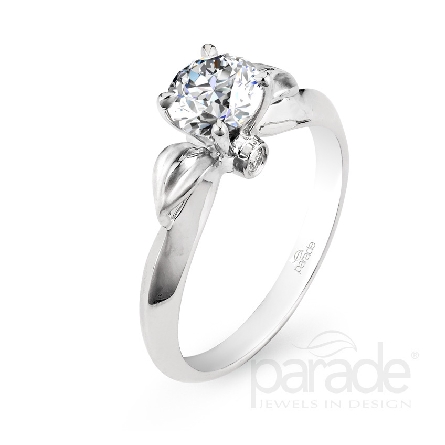 18 karat white gold engagement ring; known as Lyria Leaves and part of the Lyria Bridal Collection by Parade Designs.
Set with CZ Center.
Accented with 2 very good cut diamonds; 0.03 carat total weight; G/H; SI.