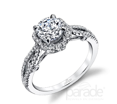 18 karat white gold engagement ring; known as Hemera Bridal by Parade Designs. - Set with Cubic Ziconia center. - Accented with round brilliant cut diamonds; 0.30 carat total weight; G/H VS-SI