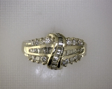 14kY 0.28ctw J-K SI2 Tapered Baguette and 0.36ctw Round Diamond Ring
