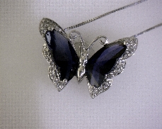 10kW Synthetic Sapphire & 0.08ctw G-H VS2-SI2 Diamond Butterfly Pendant with Chain