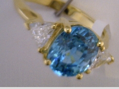 14 Karat Yelllow 4.68 CaratBlue Zircon & 0.61Carat Total Weight G I1 Diamond Ring