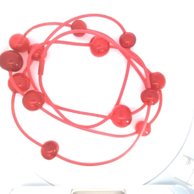 Color Love  Orbit Necklace - Red  The Orbit Necklace features hand-...