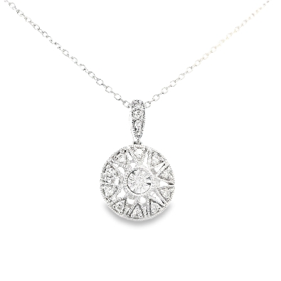 14kw gold diamond pendant and chain in the art deco style   .012 ct...