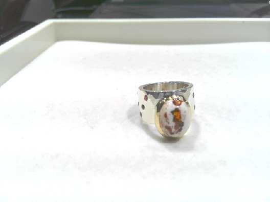 Artist: Anne-Marie Warburton  Fire Opal Cabachon Ring  One of a kin...